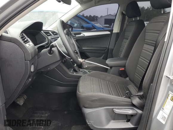 2023 Volkswagen Tiguan S with VIN 3VVRB7AX0PM107824, listed as a Copart auction lot 83444374 with 28,588 mi miles and Salvage title. Bid and sale history available at DreamBid. Image 7.