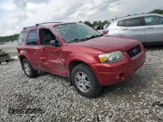 2005 Ford Escape Limited with VIN 1FMYU04165KA33277, listed as a Copart auction lot 54407625 with 217,317 mi miles and Salvage title. Bid and sale history available at DreamBid. Image 4.