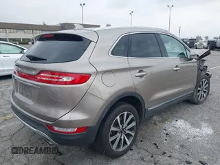 2019 Lincoln MKC Reserve with VIN 5LMCJ3C9XKUL09386, listed as a IAAI auction lot 41857681 with 66,101 mi miles and . Bid and sale history available at DreamBid. Image 4.