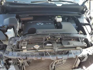 2015 Infiniti QX60 z VIN 5N1AL0MM0FC536118, wystawiony jako Copart lot #57816955 z przebiegiem 149 835 mil mil oraz Szkody całkowita. Historia ofert i sprzedaży dostępna na DreamBid. Obrazek 12.