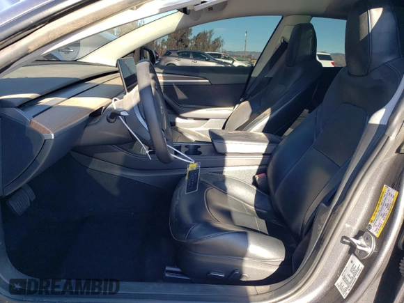 2023 Tesla Model 3 Long Range with VIN 5YJ3E1EB4PF633935, listed as a Copart auction lot 45238705 with 32,972 mi miles and Salvage Title. Bid and sale history available at DreamBid. Image 7.
