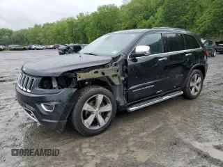 2015 Jeep Grand Cherokee Overland z VIN 1C4RJFCG2FC791302, wystawiony jako Copart lot #57977485 z przebiegiem 178 617 mil mil oraz Szkoda całkowita • Salvage title. Historia ofert i sprzedaży dostępna na DreamBid. Obrazek 1.