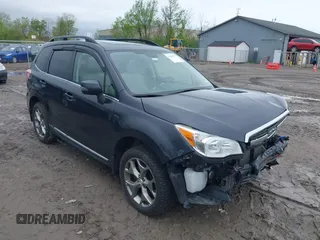 2016 Subaru Forester Touring z VIN JF2SJAXC4GH536118, wystawiony jako IAAI lot #42208701 z przebiegiem 117 227 mil mil oraz . Historia ofert i sprzedaży dostępna na DreamBid. Obrazek 1.