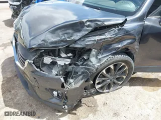 2016 Mazda CX-5 Grand Touring with VIN JM3KE4DY7G0643643, listed as a IAAI auction lot 42077497 with 120,343 mi miles. Bid and sale history available at carsss.com. Image 6.