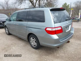2007 Honda Odyssey EX-L with VIN 5FNRL38717B018097, listed as a IAAI auction lot 42028592 with 141,004 mi miles and . Bid and sale history available at DreamBid. Image 3.