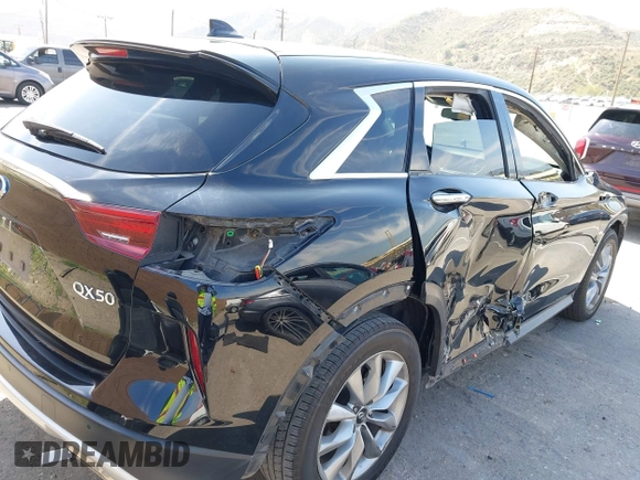 2022 Infiniti QX50 Pure z VIN 3PCAJ5AA4NF107602, wystawiony jako IAAI lot #42147112 z przebiegiem 60 872 mil mil oraz . Historia ofert i sprzedaży dostępna na DreamBid. Obrazek 6.