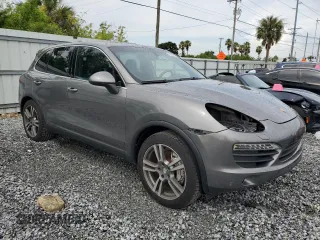 2011 Porsche Cayenne S with VIN WP1AB2A2XBLA55565, listed as a Copart auction lot 63094305 with 105,250 mi miles and Salvage title. Bid and sale history available at DreamBid. Image 4.