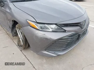 2019 Toyota Camry LE z VIN 4T1B11HK7KU759723, wystawiony jako IAAI lot #41679210 z przebiegiem 35 613 mil mil oraz . Historia ofert i sprzedaży dostępna na DreamBid. Obrazek 18.