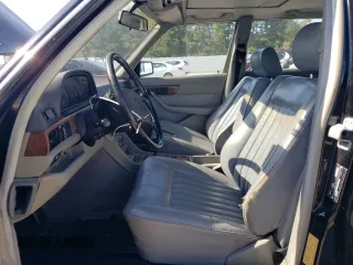 1987 Mercedes-Benz 560 with VIN WDBCA39D3HA355282, listed as a Copart auction lot 74798524 with 200,535 mi miles and Salvage Title. Bid and sale history available at DreamBid. Image 7.
