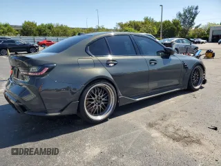 2023 BMW M3 Competition xDrive with VIN WBS43AY08PFN58052, listed as a Copart auction lot 57054885 with 28,675 mi miles and Salvage title. Bid and sale history available at DreamBid. Image 3.