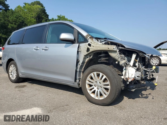 2013 Toyota Sienna XLE AAS with VIN 5TDYK3DC0DS357281, listed as a Copart auction lot 61640645 with 69,262 mi miles and Salvage title. Bid and sale history available at DreamBid. Image 4.