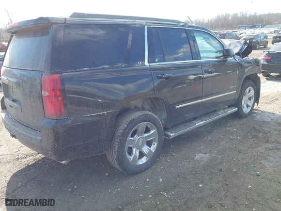 2019 Chevrolet Tahoe LT with VIN 1GNSKBKC9KR336743, listed as a IAAI auction lot 41445798 with 92,274 mi miles. Bid and sale history available at carsss.com. Image 4.
