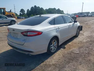 2013 Ford Fusion SE with VIN 3FA6P0HR0DR241772, listed as a IAAI auction lot 42485955 with 176,611 mi miles and . Bid and sale history available at DreamBid. Image 4.
