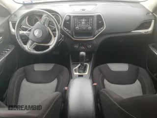 2016 Jeep Cherokee Altitude with VIN 1C4PJLAB6GW336563, listed as a Copart auction lot 47504435 with 152,479 mi miles and Salvage Title. Bid and sale history available at DreamBid. Image 8.