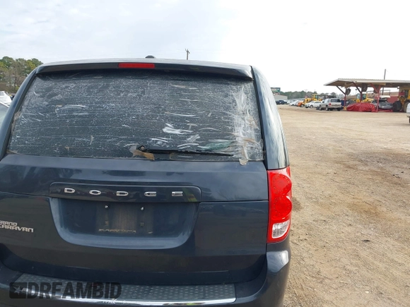 2014 Dodge Grand Caravan American Value with VIN 2C4RDGBG7ER102603, listed as a IAAI auction lot 41278072 with Not Provided miles and . Bid and sale history available at DreamBid. Image 12.