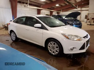 2012 Ford Focus SE with VIN 1FAHP3F26CL329142, listed as a Copart auction lot 57951835 with 159,656 mi miles and Clean title. Bid and sale history available at DreamBid. Image 4.