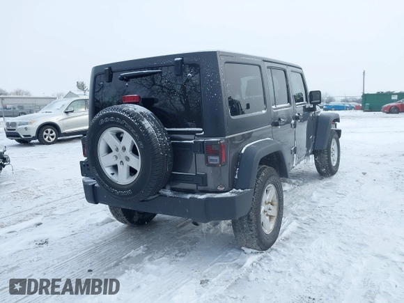 2016 Jeep Wrangler Unlimited Rubicon with VIN 1C4BJWFG7GL192698, listed as a IAAI auction lot 41603236 with 69,620 mi miles. Bid and sale history available at carsss.com. Image 4.