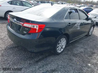 2013 Toyota Camry Hybrid LE with VIN 4T1BD1FK5DU076612, listed as a IAAI auction lot 42000025 with 210,000 mi miles. Bid and sale history available at carsss.com. Image 4.