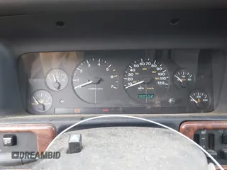 1998 Jeep Grand Cherokee Limited z VIN 1J4GZ78Y5WC261391, wystawiony jako IAAI lot #42275913 z przebiegiem 180 552 mil mil oraz . Historia ofert i sprzedaży dostępna na DreamBid. Obrazek 7.