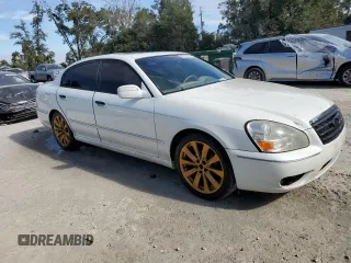 2005 Infiniti Q45 z VIN JNKBF01A85M100070, wystawiony jako Copart lot #82127494 z przebiegiem 176 578 mil mil oraz Szkoda całkowita • Salvage title. Historia ofert i sprzedaży dostępna na DreamBid. Obrazek 4.