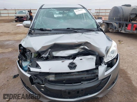 2013 Mazda 5 Sport with VIN JM1CW2BL4D0162105, listed as a IAAI auction lot 41190257 with 186,255 mi miles and . Bid and sale history available at carsss.com. Image 6.