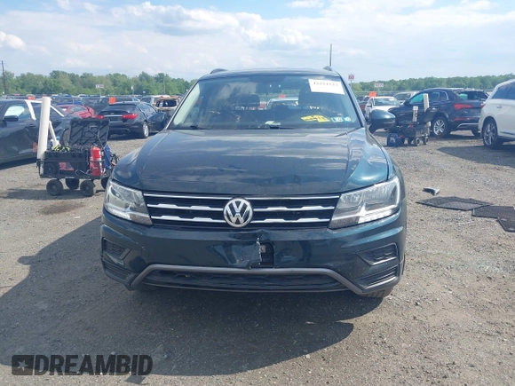 2018 Volkswagen Tiguan SEL z VIN 3VV2B7AX0JM047200, wystawiony jako IAAI lot #42221523 z przebiegiem 108 753 mil mil oraz . Historia ofert i sprzedaży dostępna na DreamBid. Obrazek 12.