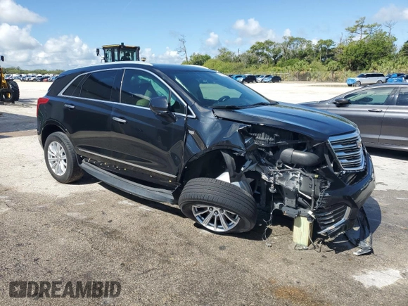 2019 Cadillac XT5 FWD with VIN 1GYKNARS9KZ219259, listed as a Copart auction lot 56900625 with 58,739 mi miles and Non repairable. Bid and sale history available at DreamBid. Image 4.
