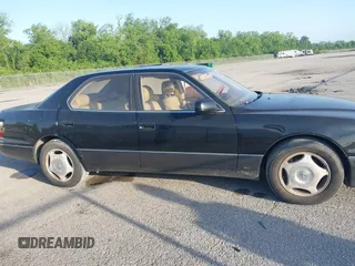 1999 Lexus LS 400 z VIN JT8BH28F4X0143726, wystawiony jako IAAI lot #42104850 z przebiegiem 184 809 mil mil oraz . Historia ofert i sprzedaży dostępna na DreamBid. Obrazek 13.