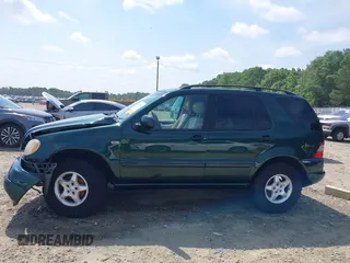 2000 Mercedes-Benz M 320/430/500 z VIN 4JGAB54E9YA180890, wystawiony jako IAAI lot #42151065 z przebiegiem 98 866 mil mil oraz . Historia ofert i sprzedaży dostępna na DreamBid. Obrazek 14.