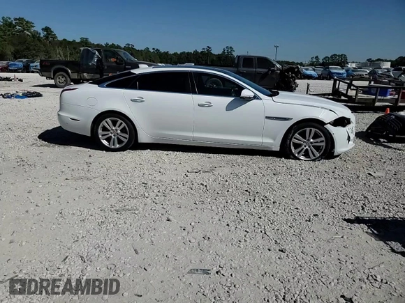 2016 Jaguar XJ Portfolio with VIN SAJWA2G79G8W00955, listed as a Copart auction lot 77650194 with 60,515 mi miles and Clean title. Bid and sale history available at DreamBid. Image 13.