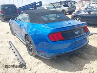 2020 Ford Mustang EcoBoost with VIN 1FATP8UH9L5134364, listed as a IAAI auction lot 41948736 with 104,298 mi miles. Bid and sale history available at carsss.com. Image 3.