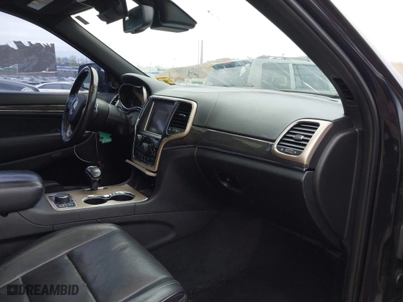 2014 Jeep Grand Cherokee Overland with VIN 1C4RJFCG6EC121654, listed as a IAAI auction lot 42051730 with 163,853 mi miles. Bid and sale history available at carsss.com. Image 5.