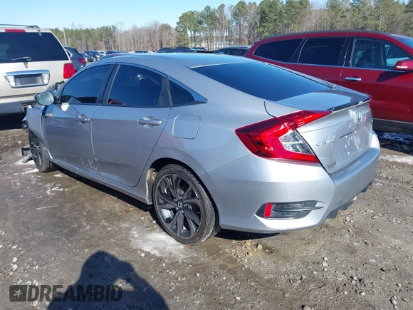 2019 Honda Civic Sport with VIN 2HGFC2F85KH605786, listed as a IAAI auction lot 41621480 with 66,438 mi miles and . Bid and sale history available at DreamBid. Image 3.