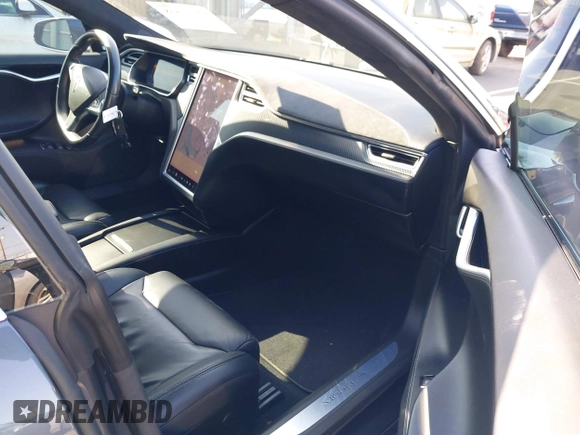2017 Tesla Model S 100D with VIN 5YJSA1E49HF189008, listed as a IAAI auction lot 42051518 with 49,145 mi miles and . Bid and sale history available at DreamBid. Image 5.