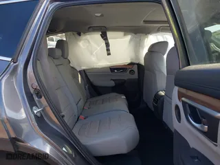 2021 Honda CR-V Touring with VIN 2HKRW2H9XMH645901, listed as a IAAI auction lot 41870446 with 22,996 mi miles. Bid and sale history available at carsss.com. Image 8.