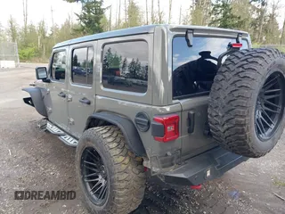 2021 Jeep Wrangler Unlimited Rubicon with VIN 1C4HJXFG9MW531858, listed as a IAAI auction lot 42001095 with 38,240 mi miles and . Bid and sale history available at DreamBid. Image 3.