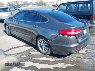 2019 Ford Fusion SE with VIN 3FA6P0HD5KR176497, listed as a IAAI auction lot 41633087 with 103,876 mi miles and . Bid and sale history available at carsss.com. Image 3.