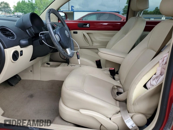 2010 Volkswagen Beetle with VIN 3VWRW3AG9AM025249, listed as a Copart auction lot 56785885 with 85,385 mi miles and Salvage title. Bid and sale history available at DreamBid. Image 7.