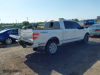 2013 Ford F-150 XLT with VIN 1FTFW1E63DFD68137, listed as a IAAI auction lot 39486139 with 169,017 mi miles. Bid and sale history available at carsss.com. Image 4.