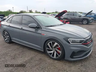 2021 Volkswagen Jetta GLI S with VIN 3VW6T7BU8MM011418, listed as a IAAI auction lot 40474082 with 76,619 mi miles and . Bid and sale history available at DreamBid. Image 1.