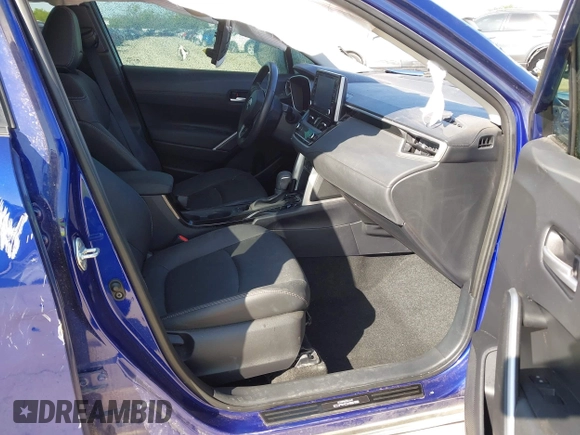 2022 Toyota Corolla Cross XLE with VIN 7MUDAAAG8NV027585, listed as a IAAI auction lot 41781177 with 36,841 mi miles and . Bid and sale history available at DreamBid. Image 5.