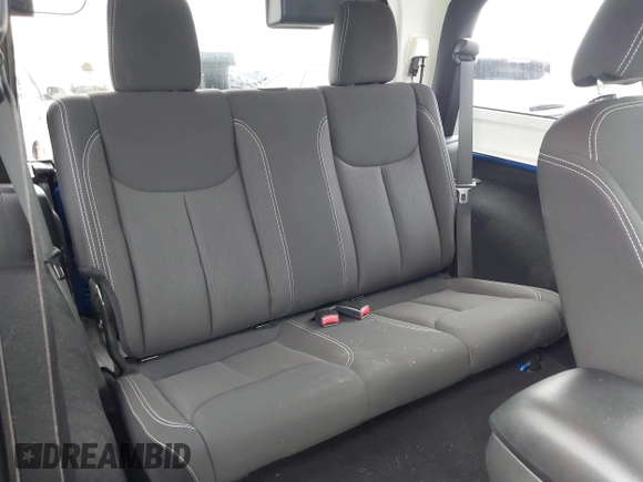2015 Jeep Wrangler Sahara with VIN 1C4AJWBG9FL663959, listed as a IAAI auction lot 42133900 with 56,253 mi miles and . Bid and sale history available at DreamBid. Image 8.