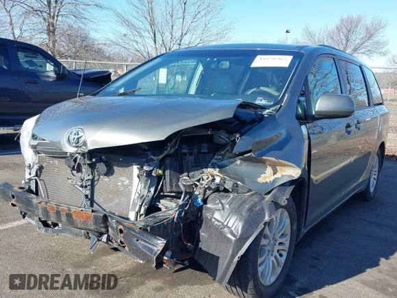 2011 Toyota Sienna XLE AAS with VIN 5TDYK3DC4BS072693, listed as a IAAI auction lot 41579262 with 146,201 mi miles. Bid and sale history available at carsss.com. Image 17.