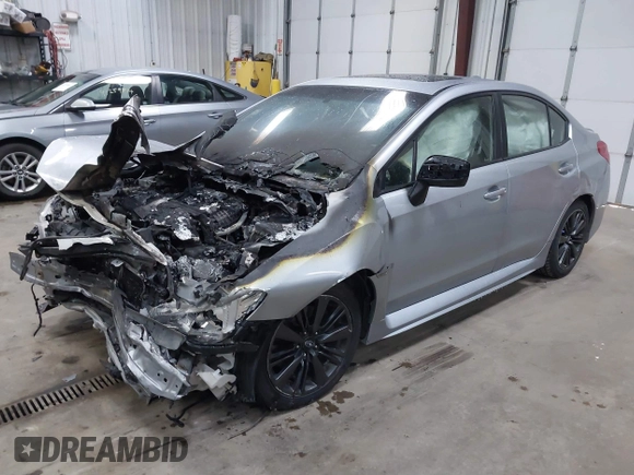 2015 Subaru WRX Premium with VIN JF1VA1D66F8830943, listed as a IAAI auction lot 41282679 with 149,236 mi miles. Bid and sale history available at carsss.com. Image 2.