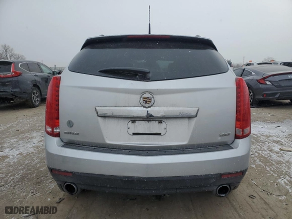 2012 Cadillac SRX with VIN 3GYFNGE38CS637961, listed as a Copart auction lot 42061715 with 130,657 mi miles and Salvage Title. Bid and sale history available at carsss.com. Image 6.