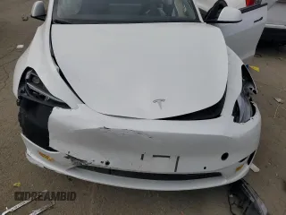 2022 Tesla Model Y Performance with VIN 7SAYGDEF1NF410241, listed as a Copart auction lot 45017155 with 42,652 mi miles and Salvage Title. Bid and sale history available at DreamBid. Image 12.