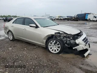 2014 Cadillac CTS Luxury RWD with VIN 1G6AR5S35E0170749, listed as a Copart auction lot 50735645 with 105,638 mi miles and Salvage Title. Bid and sale history available at DreamBid. Image 4.