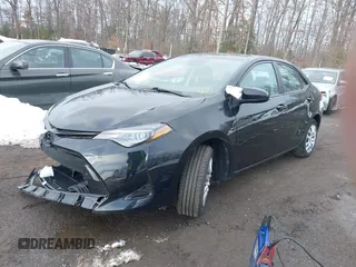 2018 Toyota Corolla L z VIN 5YFBURHE0JP801312, wystawiony jako IAAI lot #41235233 z przebiegiem 92 340 mil mil oraz . Historia ofert i sprzedaży dostępna na DreamBid. Obrazek 17.