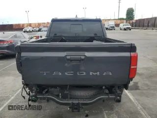 2025 Toyota Tacoma SR with VIN 3TMLB5JN4SM104263, listed as a Copart auction lot 54402775 with 1,010 mi miles and Salvage Title. Bid and sale history available at DreamBid. Image 6.