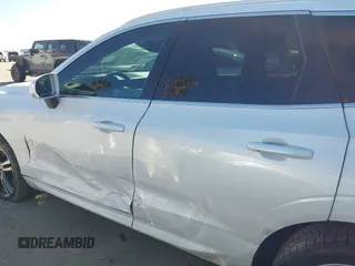 2020 Volvo XC60 Momentum with VIN YV4A22RK6L1553603, listed as a IAAI auction lot 41103991 with 67,509 mi miles and . Bid and sale history available at DreamBid. Image 14.